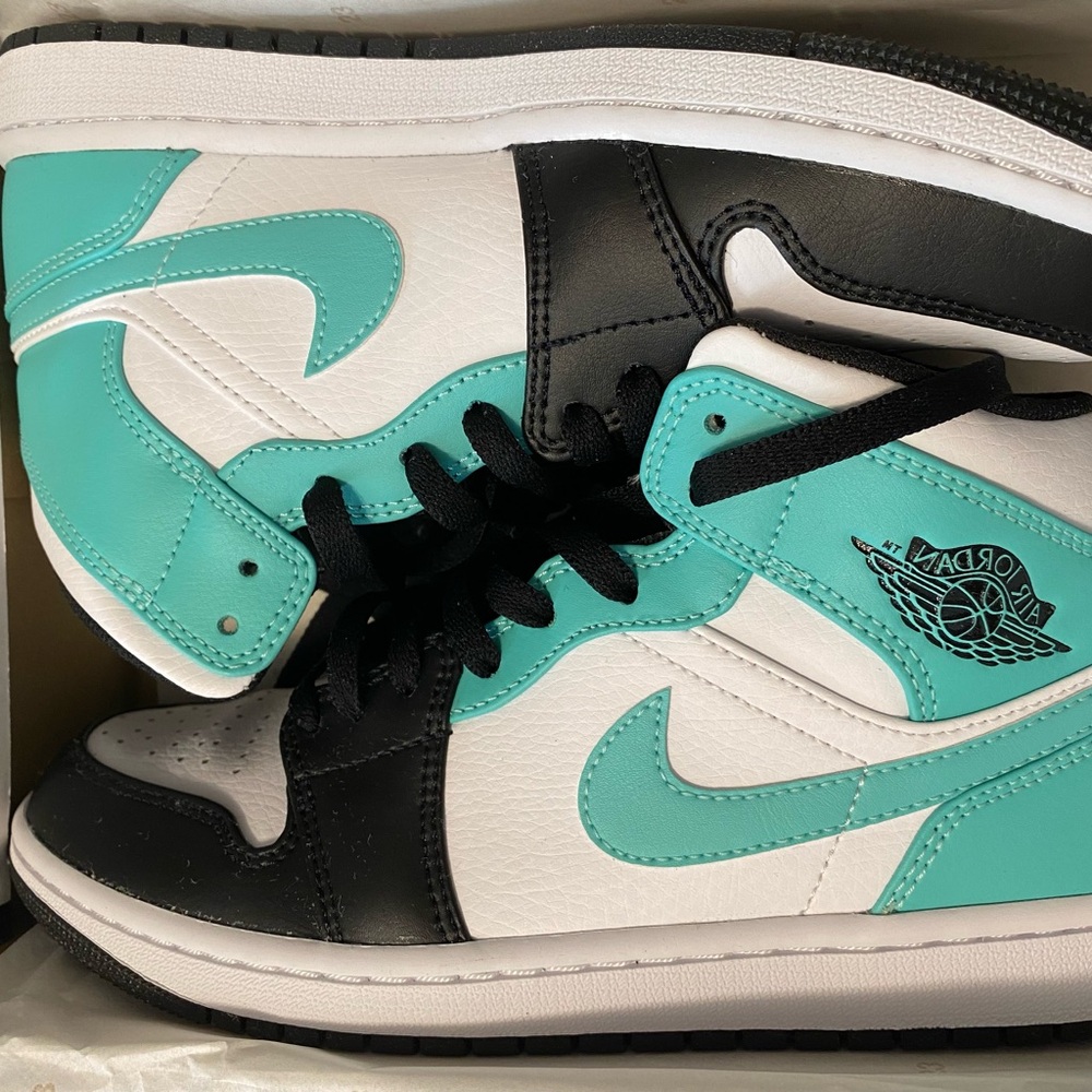 Air Jordan Sneakers in Black, White, and Teal